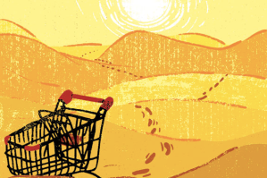 image of empty shopping cart and footsteps tracked across a desert